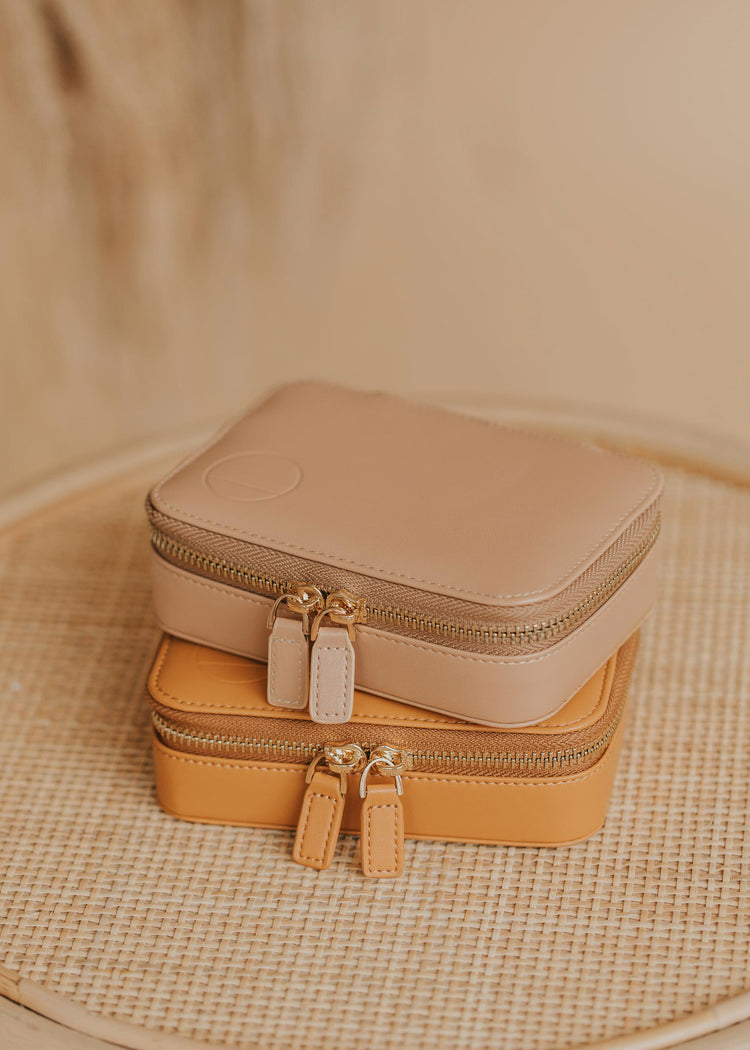 A travel jewelry organizer from Hello Adorn, a small jewelry case to take with you on all your travel adventures offered in two colors.