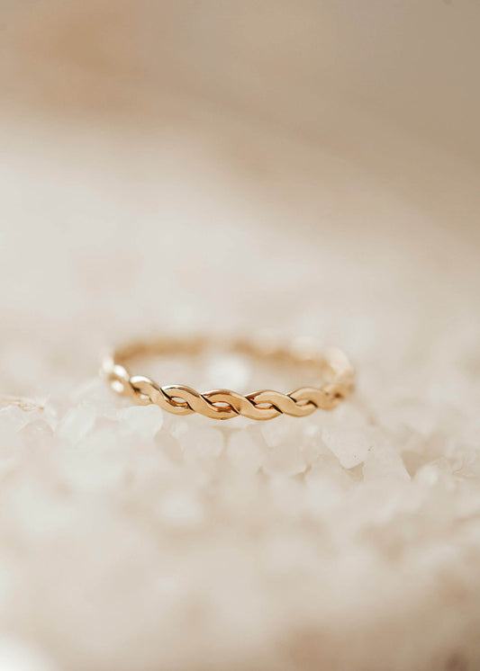 A braided ring created by Hello Adorn to wear as a stacking ring in your new ring stack.