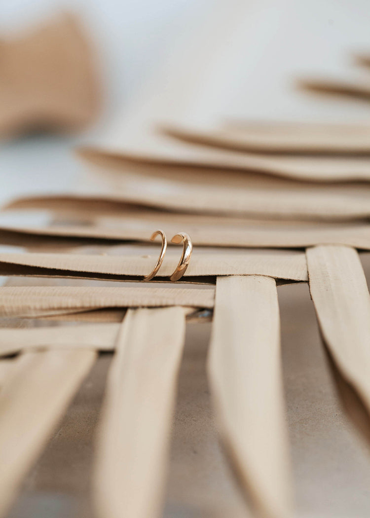 A close up look of the Ear Cuff Duo by Hello Adorn that has a thin ear cuff and a thick ear cuff for non pierced ears or earrings for no piercings.