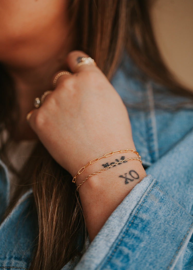 Beautifully stacked 14kt Gold Fill bracelets featuring a double rope chain bracelet.