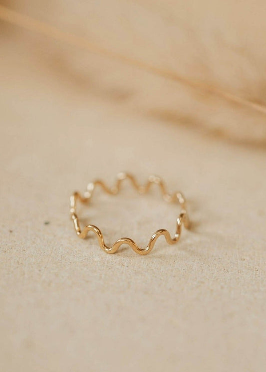 A curved ring with a zig zag ring look, handmade jewelry by Hello Adorn shown in 14k gold fill.
