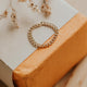 A chain ring in 14k gold fill created by Hello Adorn in the Dani Chain Ring design inspired by layering chains.