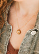 Gold Hello Adorn Mental Health necklace with circular pendant