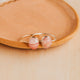 14K Gold Fill and Sterling Silver Rosalie Ring by Hello Adorn - two pink stone oval rings displayed on ceramic dish