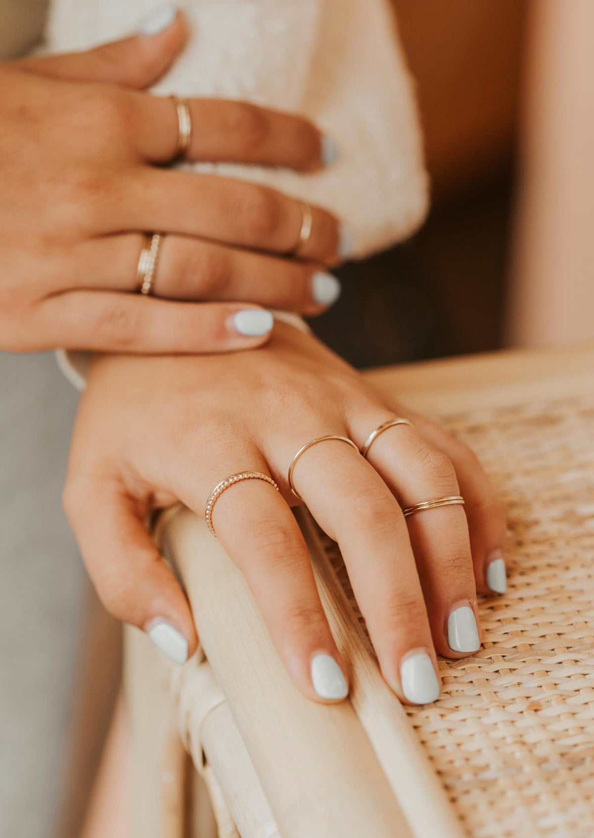 Gold Tenny-Tiny Band perfect for stacking rings By Hello Adorn styled with Confetti Ring, Beaded Ring to create a ring stack.