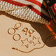 Hello Adorn Star Threader Earrings styled on a flat with other Americana props.
