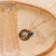 Gold Hello Adorn Mental Health necklace with circular pendants and meaning charms