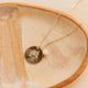 Gold Hello Adorn Mental Health necklace with circular pendants and meaning charms