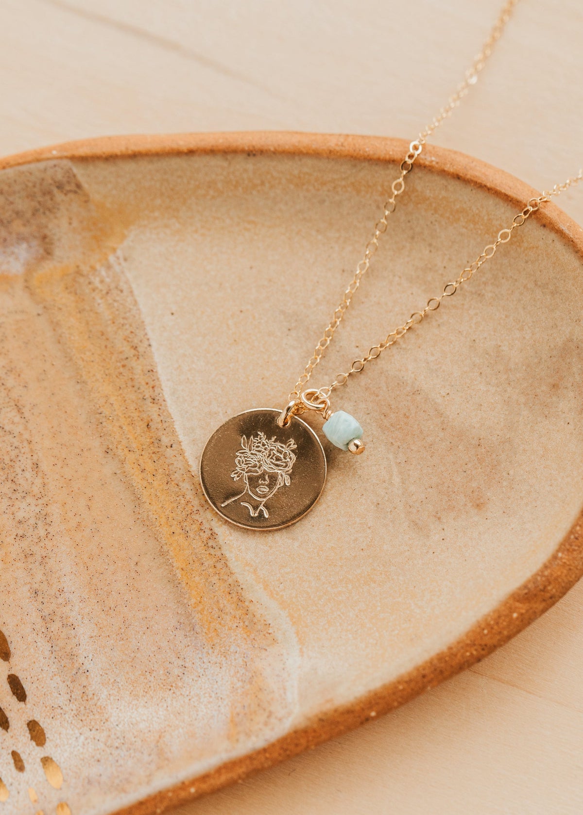 Gold Hello Adorn Mental Health necklace with circular pendants and meaning charms