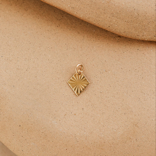 Sunburst Charm