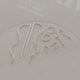 Gold earring hooks on a light gray background with 'indy' branding.