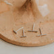 Sterling silver dainty earrings by Hello Adorn, bar stud earring style.