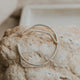 A silver cuff bracelet with a chain bracelet attached for an everyday jewelry piece created by Hello Adorn.