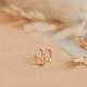 Gold double up ear cuff shown laying flat by Hello Adorn.
