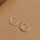 A silver ear cuff pair for people looking for earrings for no piercings, Hello Adorn created this Ear Cuff Duo that includes a thin ear cuff duo and a thick ear cuff duo.