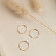 Tenny-Tiny Band By Hello Adorn laying flat in a group of three stacking rings.